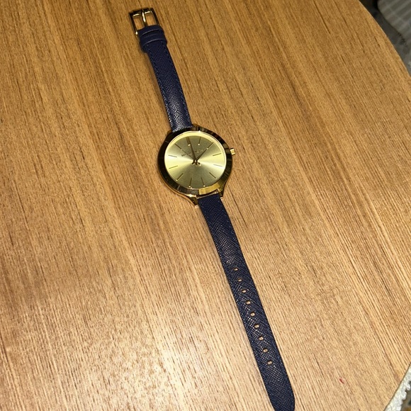 Beautiful authentic gold Michael Kors watch with a navy blue leather strap. - Picture 3 of 3